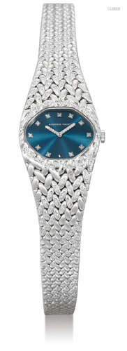 Audemars Piguet, A Lady's White Gold and Diamond-Set Oval Bracelet Watch