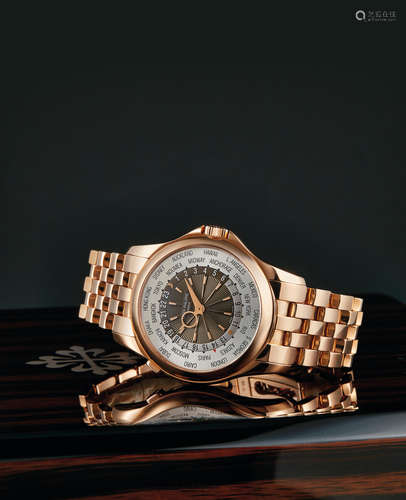 Patek Philippe, A Fine Pink Gold Automatic World Time Wrist Watch with Bracelet