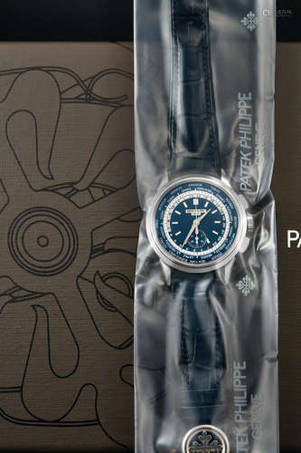 Patek Philippe, A Fine and Rare White Gold WorldTime Chronograph Automatic Wristwatch, Single-Sealed