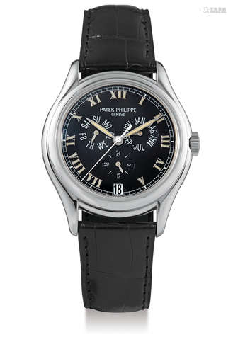 Patek Philippe, A Fine White Gold Automatic Centre Seconds Annual Calendar Wristwatch