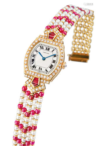 Cartier, A Rare Lady's Yellow Gold, Ruby, Diamond and Pearl-Set Tonneau Bracelet Watch