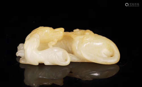 A HETIAN JADE CARVED DOG SHAPE FIGURE