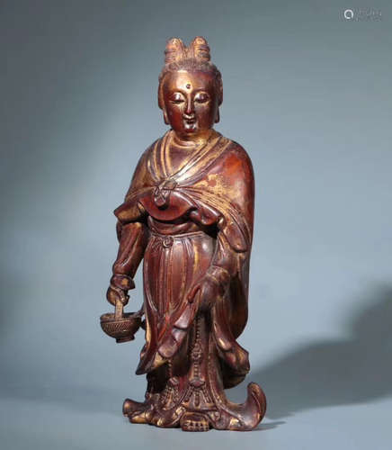 AN OLD ZITAN WOOD GUANYIN