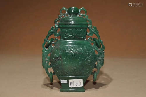 A DONGLING STONE CARVED VASE