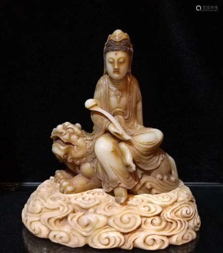 A WHITE TIANHUANG STONE CARVED GUANYIN FIGURE