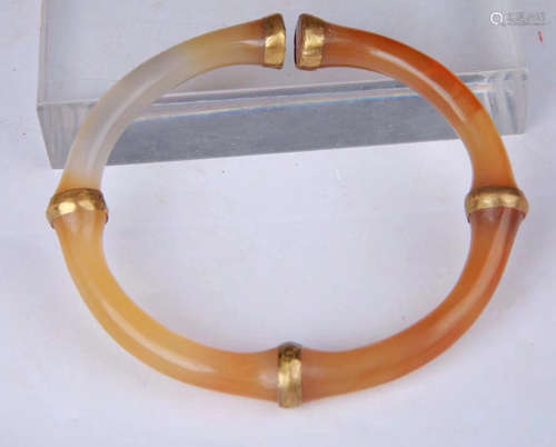 A OLD AGATE CARVED BANGLE