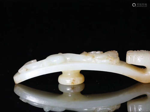 A HETIAN JADE CARVED HOOK PENDANT