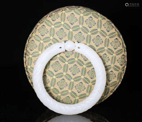 A HETIAN JADE CARVED DRAGON SHAPE BANGLE