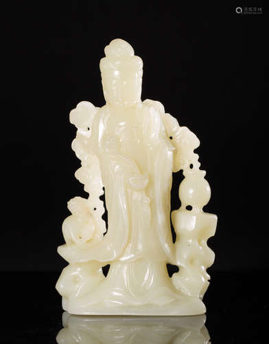 A HETIAN JADE CARVED GUANYIN FIGURE