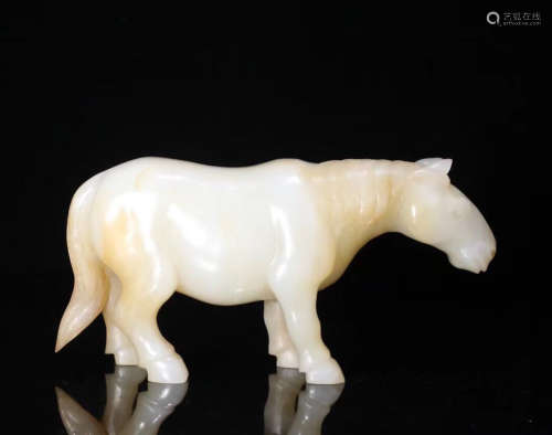 A HETIAN JADE CARVED HORSE SHAPED FIGURE