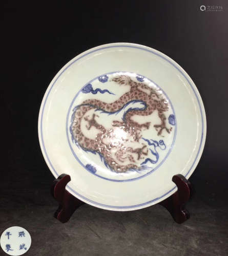 A RED GLAZED DRAGON PATTERN PLATE