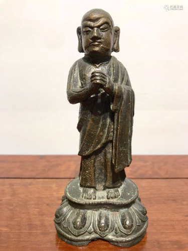 A COPPER MOLDED BUDDHA STANDING STATUE