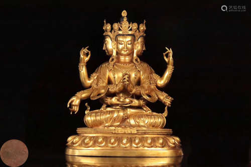 A GILT BRONZE MOLDED BUDDHA STATUE