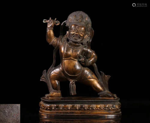 A BRONZE GILT DAHEITIAN FIGURE