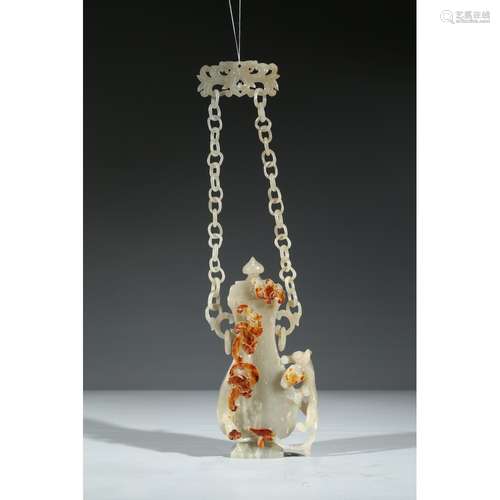 A CARVED HETIAN JADE HANGING VASE