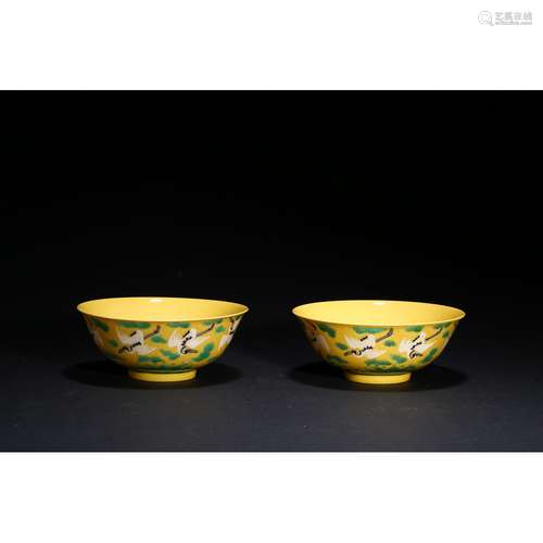 A PAIR OF GREEN AND YELLOW-GLAZED BOWLS