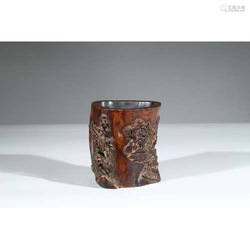 A HUANGHUALI CARVED 'LANDSCAPE' BRUSHPOT