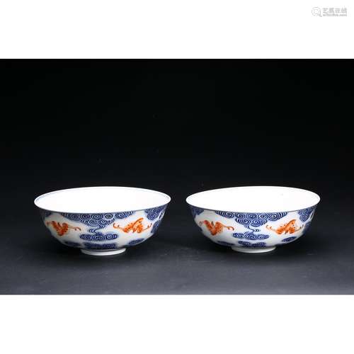 A PAIR OF BLUE AND WHITE 'BATS' BOWLS