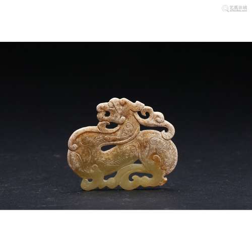 A CARVED JADE DRAGON-SHAPE PENDANT