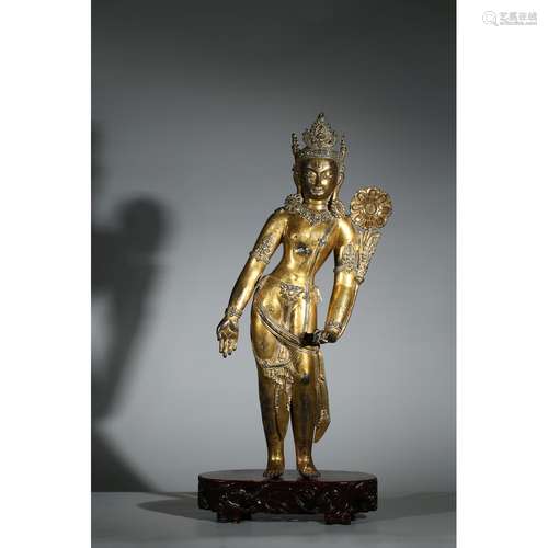 A GILT-BRONZE STANDING FIGURE OF MAITREYA