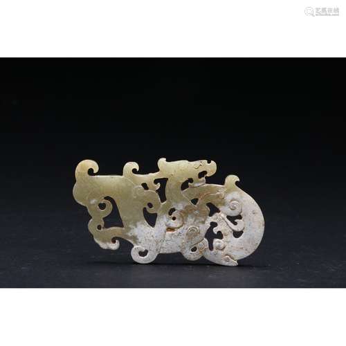 A CARVED JADE 'DRAGON AND PHOENIX' PENDANT