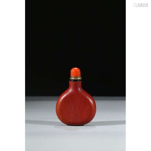 A CARVED GOURD SNUFF BOTTLE