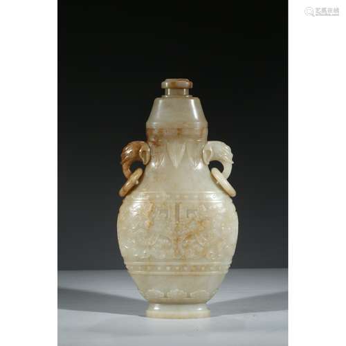 A CARVED WHITE JADE VASE AND COVER