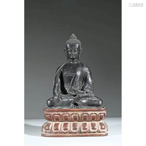 A CARVED WOOD FIGURE OF SHAKYAMUNI BUDDHA