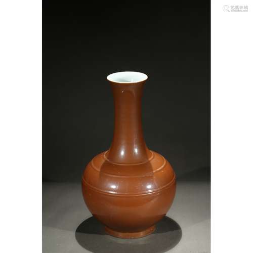 A CAFE-AU-LAIT GLAZED BOTTLE VASE