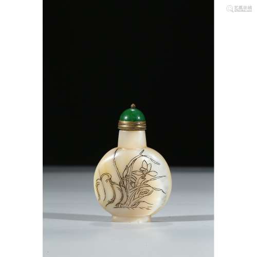 A CARVED MOTHER OF PEARL SNUFF BOTTLE
