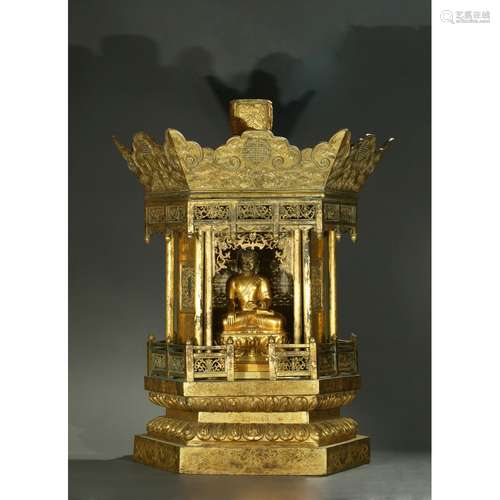 A LARGE AND RARE GILT-BRONZE BUDDHIST SHRINE AND BUDDHA FIGURE