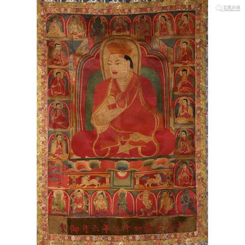 AN EMBROIDERED 'LAMA' THANGKA HANGING SCROLL