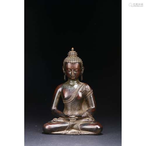 A BRONZE FIGURE OF SEATED SHAKYAMUNI