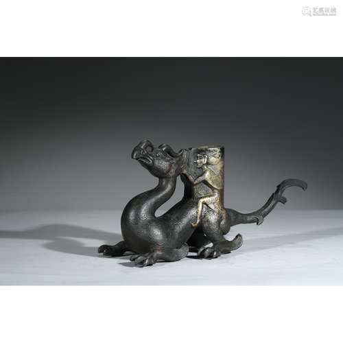 A SILVER MODEL OF MYTHICAL BEAST AND FIGURE