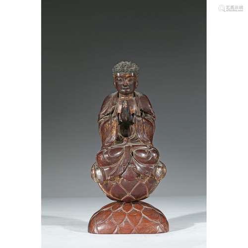 A CARVED WOOD FIGURE OF SHAKYAMUNI