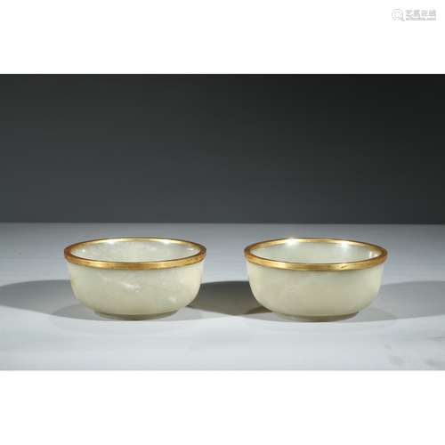 A PAIR OF CARVED WHITE JADE BOWLS