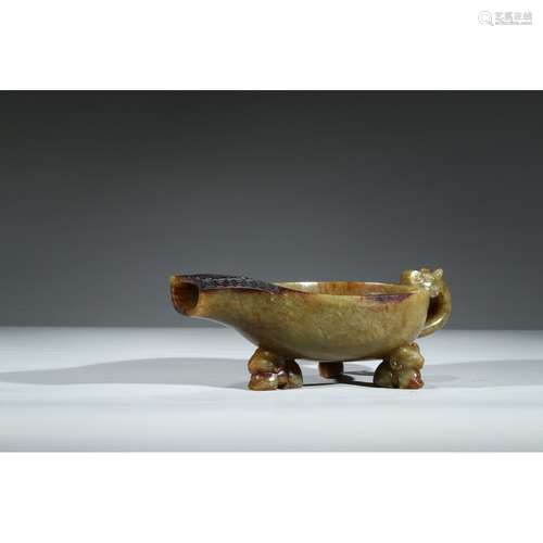 A CARVED ARCHAIC JADE VESSEL