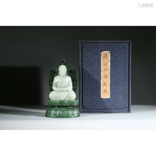 A WHITE JADE FIGURE OF BUDDHA