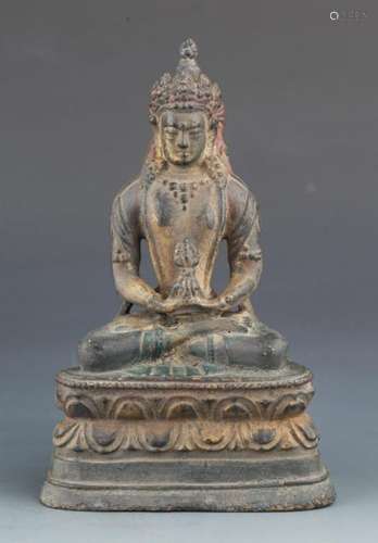 A BRONZE FIGURE OF SEATED DEITY