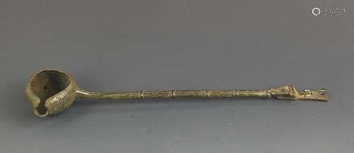 A LONG HANDLE BRONZE SPOON