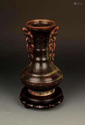 A BROWN GROUND DRAGON HANDLE VASE