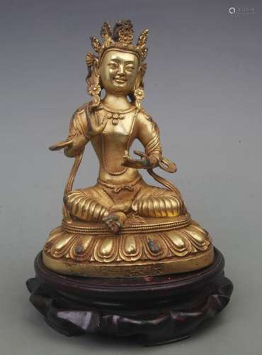 A REAR GILT BRONZE TREASURE BUDDHA FIGURE