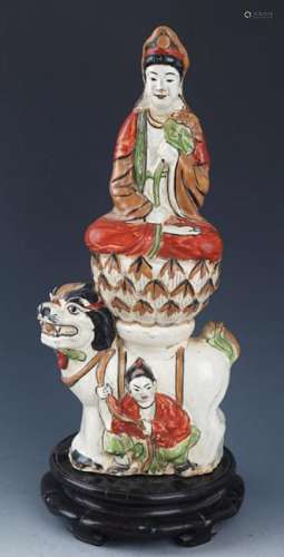 A FAMILLE-ROSE PAINTED PORCELAIN GUAN YIN