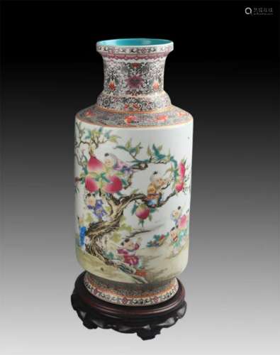 A FAMILLE ROSE MONKEY AND PEACH PORCELAIN VASE