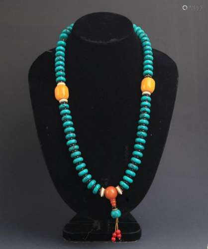 A TURQUOISE WITH BEE WAX NECKLACE