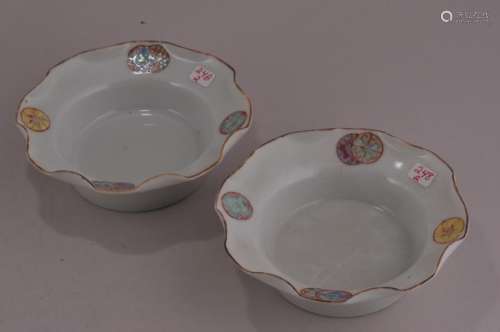 Pair of porcelain saucers. China. Late 19th to early 20th century. Famille rose decoration of brocade spheres.  4-1/2