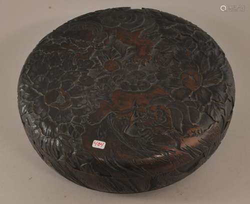 Carved round wooden box. Japan. Early 20th century. Surfaces carved with foo dogs and peony flowers. Carvers name on base.  9-1/2