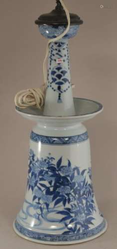 Large blue and white Asian porcelain altar stick. Floral decoration. Hallmark inside base. Height of stick- 16-3/4