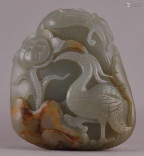 19th century Chinese carved Celadon Jade pebble with Phoenix bird and flower decoration. Russet highlights. 2-3/4 