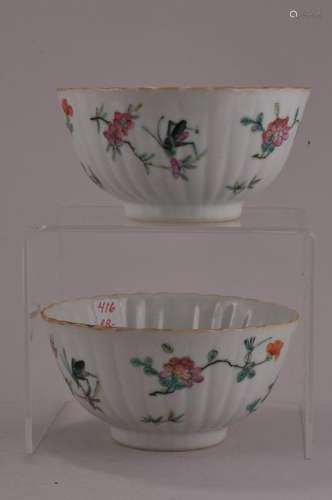 Pair of porcelain bowls. China. Tung Chih mark. (1862-1874). Ribbed bodies. Famille Rose decoration of insects and flowers.  4